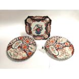 A 19th Century square foliated Imari plate with central floral display, with various cartouches of
