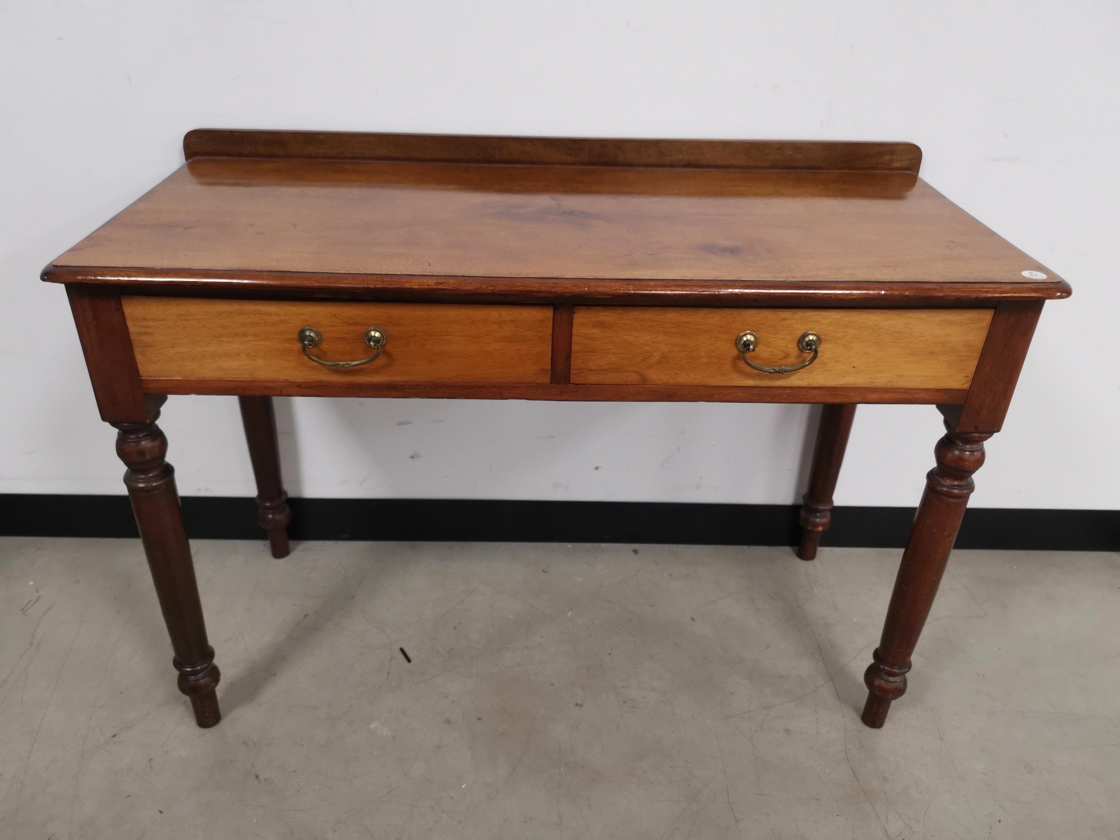 19th Century side table, two drawers to frieze, raised on turned supports.