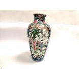 A Japanese polychrome enamel vase of substantial proportions with two cartouches of beauties in a