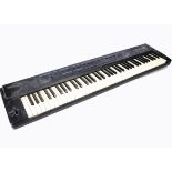 Roland Keyboard, a Roland Midi Keyboard Controller model A-33 S/N AL47962 with power cable,