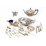 A collection of silver plated items, including a glass and silver plated claret jug, cruet set and