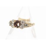 An 18ct gold diamond ring, with central setting vacant, the three old cut diamonds set to each