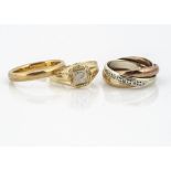Three gold rings, including a 22ct gold wedding band, ring size N, 4.7g, a continental 750 marked