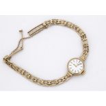 A c1980s Rotary 9ct gold ladies wristwatch, 17mm, having integrated 9ct gold bracelet, appears to