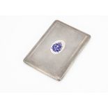 An Art Deco silver cigarette case by WFW, engine turned having blue enamel monogram and coronet, 5.7