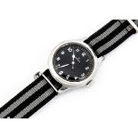 A 1956 Omega Military Royal Air Force stainless steel wristwatch, 36mm case, running, black dial