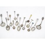 A collection of silver teaspoons and coffee spoons, including a silver gilt and enamel coffee