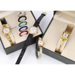Four ladies wristwatches, including a gilt Raymond Weil on black leather strap in in black pouch,