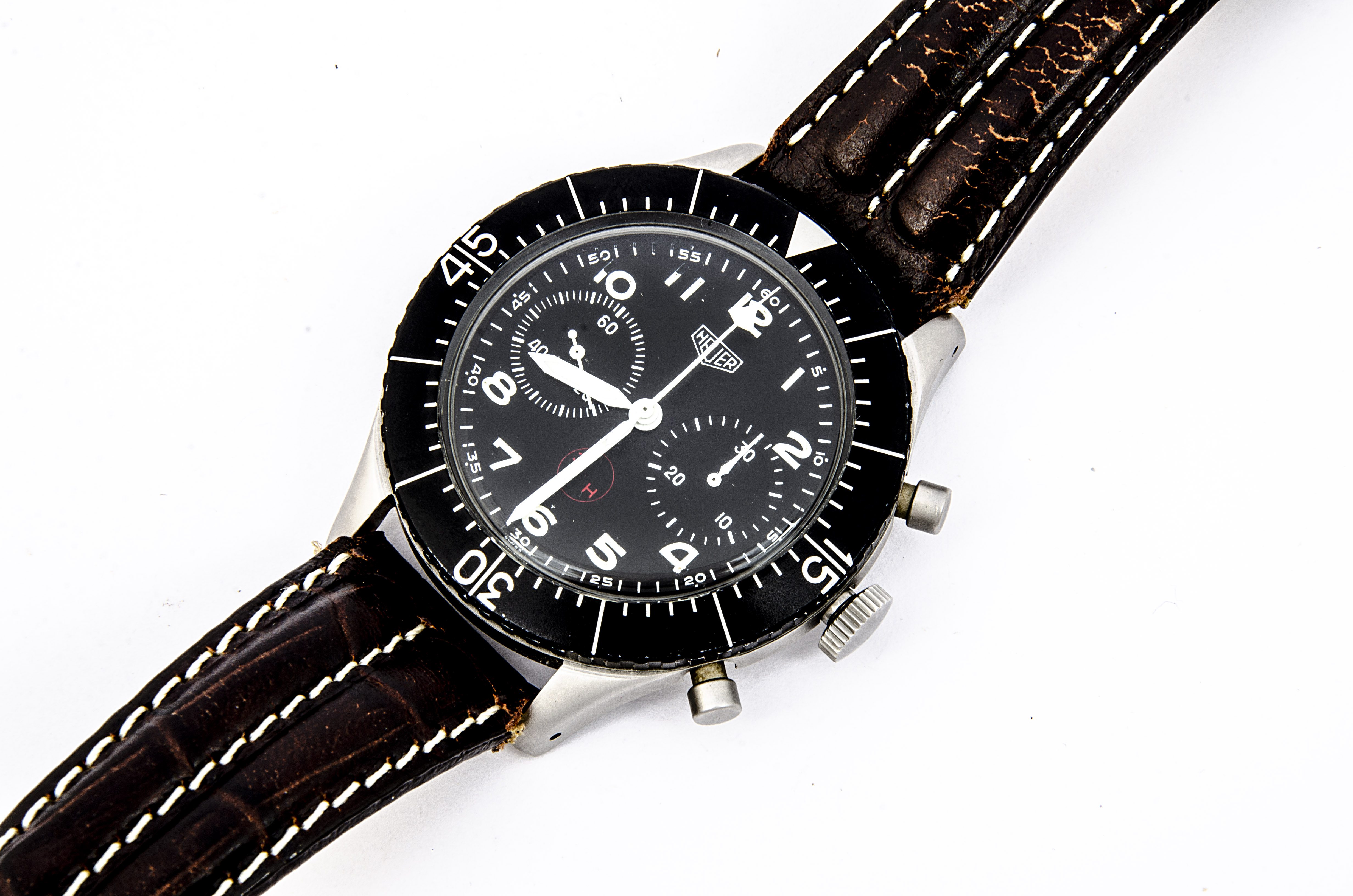 A 1970s Heuer German Military stainless steel wristwatch, 43mm case, running and stopwatch