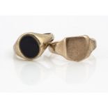 A 9ct gold signet ring, with shield shaped tablet, ring size R together with an onyx signet ring