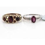 A 9ct gold garnet dress ring, with one setting vacant, ring size Q, together with a white 9ct gold