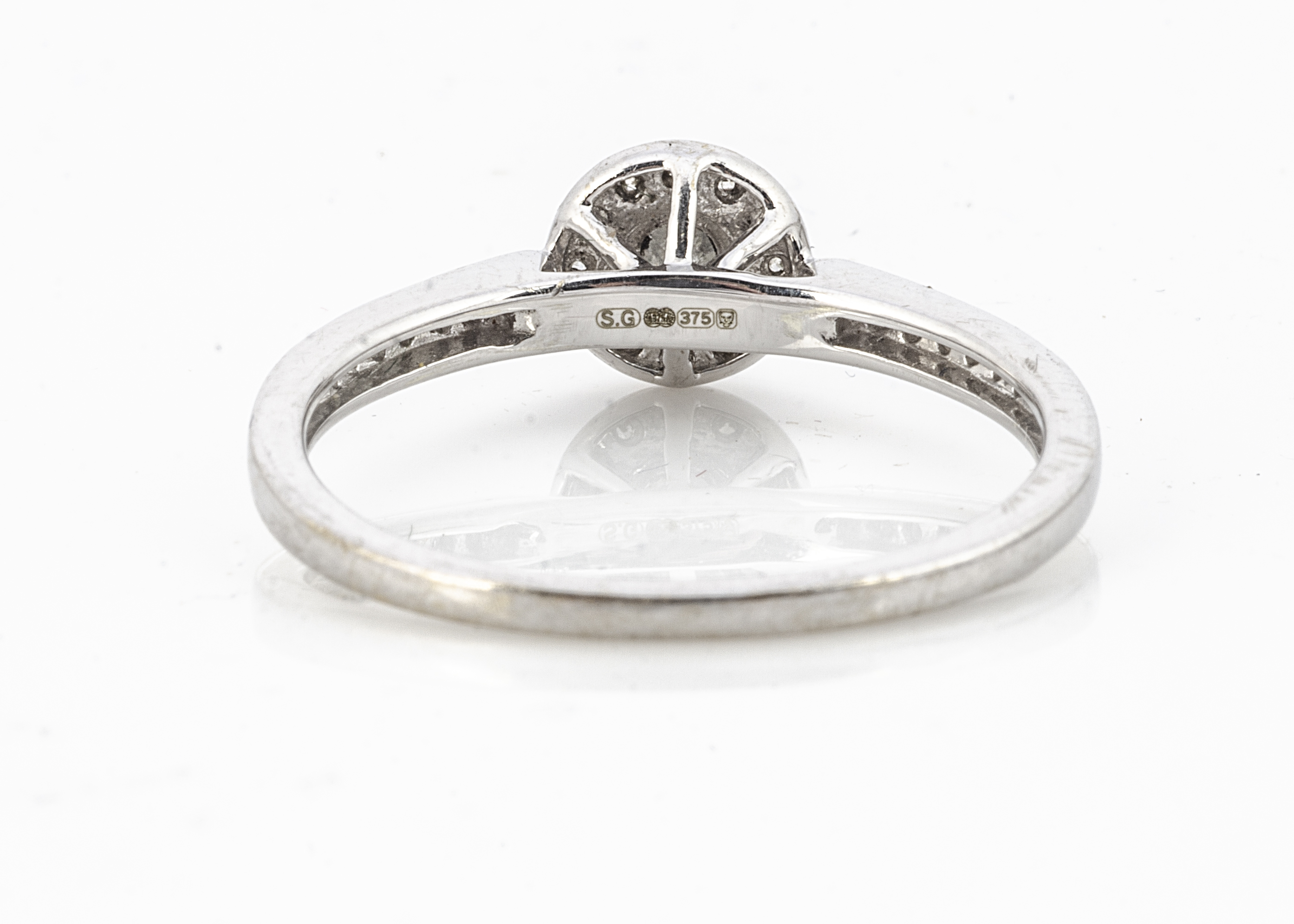 A 9ct white gold diamond dress ring, marked 9kt, the brilliant cut diamond in claw setting - Image 2 of 2