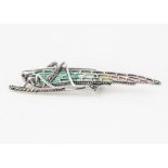 A white metal plique a jour locust brooch, set with cabochon ruby eye and marcasites, 7cm x 1.5cm,