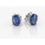 A pair of oval mixed cut kyanite ear studs, in claw settings and white metal posts marked 925