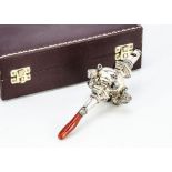 A c1960s silver and coral baby's rattle, in fitted Asprey & Co box, 13cm long, 2.1 ozt, marks worn