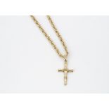 A continental yellow metal 750 marked curb link necklace and cross pendant, 28cm together