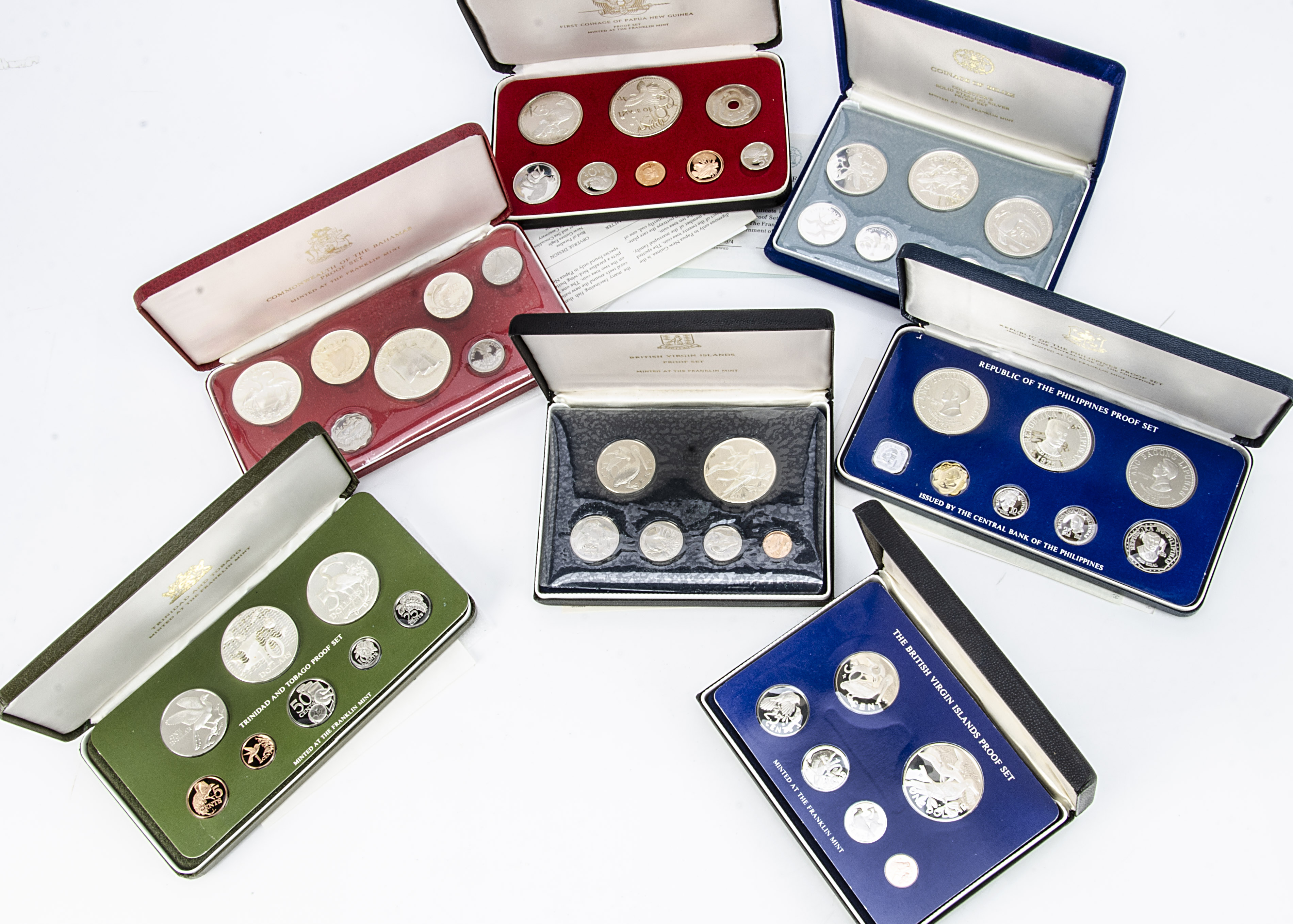 A 1974 Coinage of Belize Silver Proof Eight Coin set, together with six further commonwealth coin