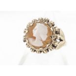 A 9ct gold circular cameo ring, with feathered setting, ring size L 1/2, 5.4g