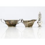 An Art Deco period silver milk jug and sugar basin by Walker & Hall, hexagonal with applied handles,