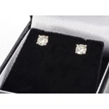 A pair of brilliant cut white gold diamond stud earrings, 0.87ct, marked 750, boxed