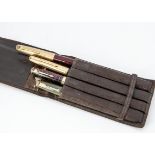 Four vintage fountain pens, including a Parker Duofold, a Parker Vacumatic, a Parker 61, and