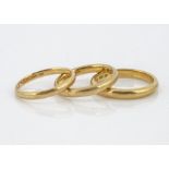 Three 22ct gold D shaped wedding bands, one size S, 2 x size P, 13.7g