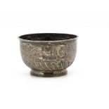 A Victorian silver sugar basin by Edward Hutton, circular footed bowl with raised design, 4.1 ozt,