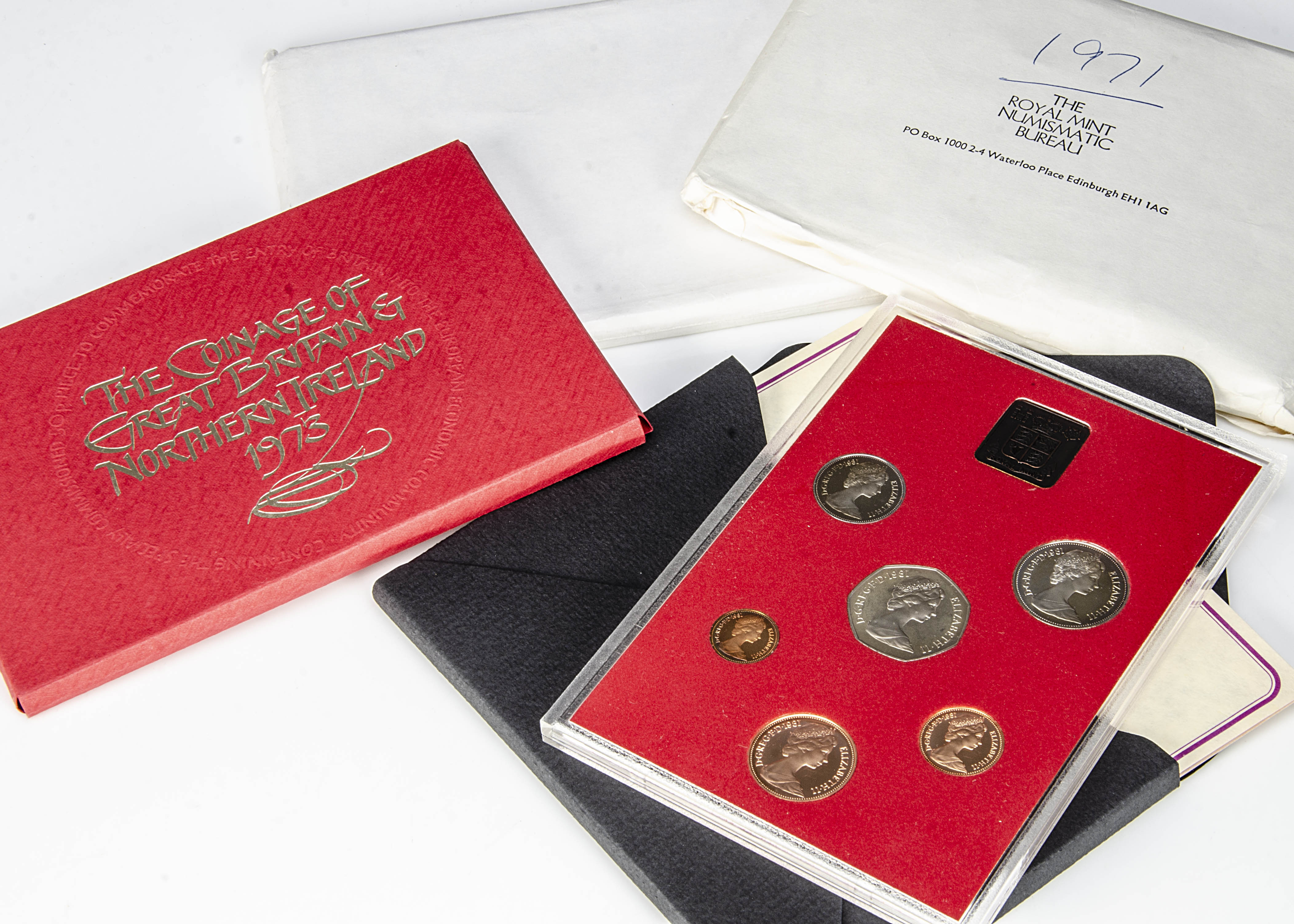 A set of nineteen Royal Mint UK proof coin sets, a run of coin sets from 1971 to 1989, appear