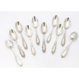 A set of ten Sterling teaspoons, with rococo themed handles, 9.84 ozt (10)