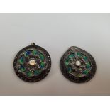 A pair of Edwardian Liberty Cymric silver and enamel buckles, of circular design centred with