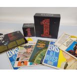 A large collection of Elvis memorabilia, mostly vinyl records, a 78, a box set of limited edition