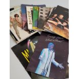 A collection of pop concert programmes, including Bucks Fizz, Rod Stewart, George Michael,