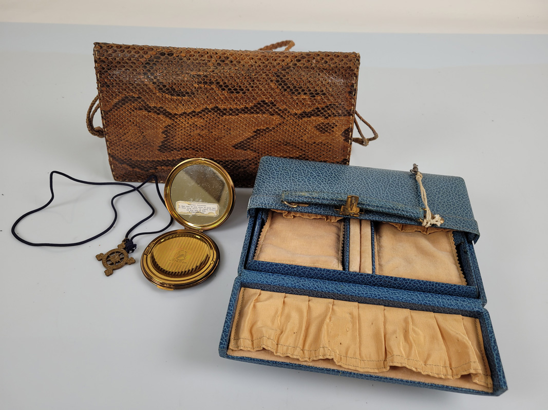 A blue leather jewellery box, with central open section which lifts out, together with a snake