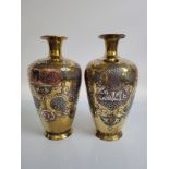 A pair of late 19th or early 20th Century Middle Eastern brass, silver and copperware ovoid vases,