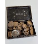 A collection of Victorian and later pennies, all contained in a small black and gilt cash tin