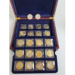 A set of twenty T.D.C commemorative base metal crowns, together with an 1888 Mogan head crown and