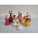 A collection of seven porcelain figures, by Royal Doulton and Coalport, including Christine