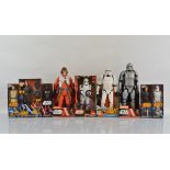 A collection of Star Wars boxed figures, including Hasbro and Disney Store examples (9)