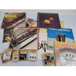 A collection of Beatles records, including a mono Please Please me, Sgt Peppers Lonely Hearts Club