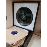 A wind up gramophone, a circular leather cased 78 container, various other 78s