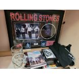 Two Rolling Stones T Shirts, a Rolling Stones framed Black Rain limited edition art work, two