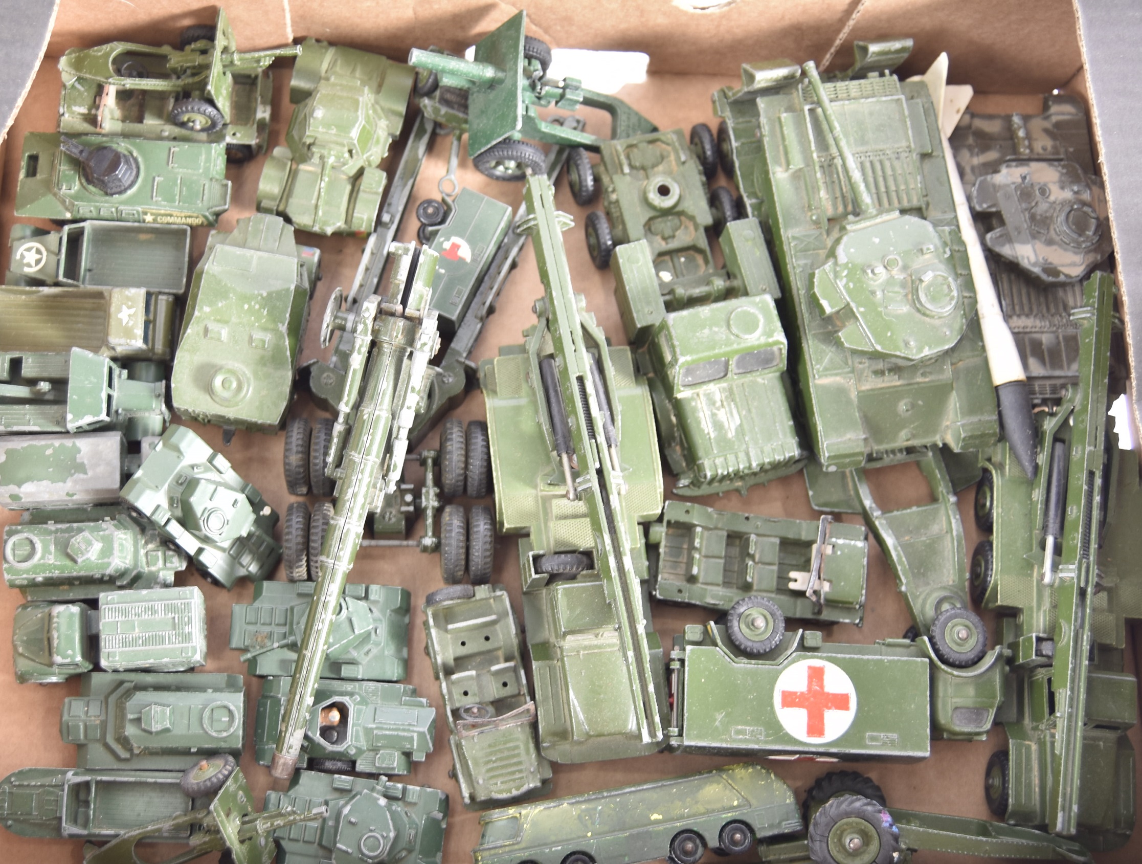 Unboxed Playworn Post-war Military Vehicles and Field Guns, in various scales includes examples by