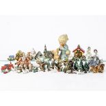 Various toys and ornaments, a Goebel kneeling girl and doll praying, Byi 38 --6¼in. (16cm.) high; an