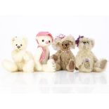 Four artist teddy bears, three Nita Schwenn bears each with an embroidered flower of foot --7½in. (