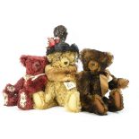 Three Hug-a-Bear artist teddy bears by Janet Reeves, the largest 'Miss Hildegard' wearing hat,