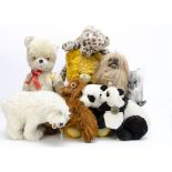 Three Hansa soft toys, a koala, polar bear --13in. (33cm.) high and orangutan, all with card tags; a