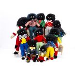 Eleven Merrythought Gollies, some limited editions, four with musical instruments --19in. (48.