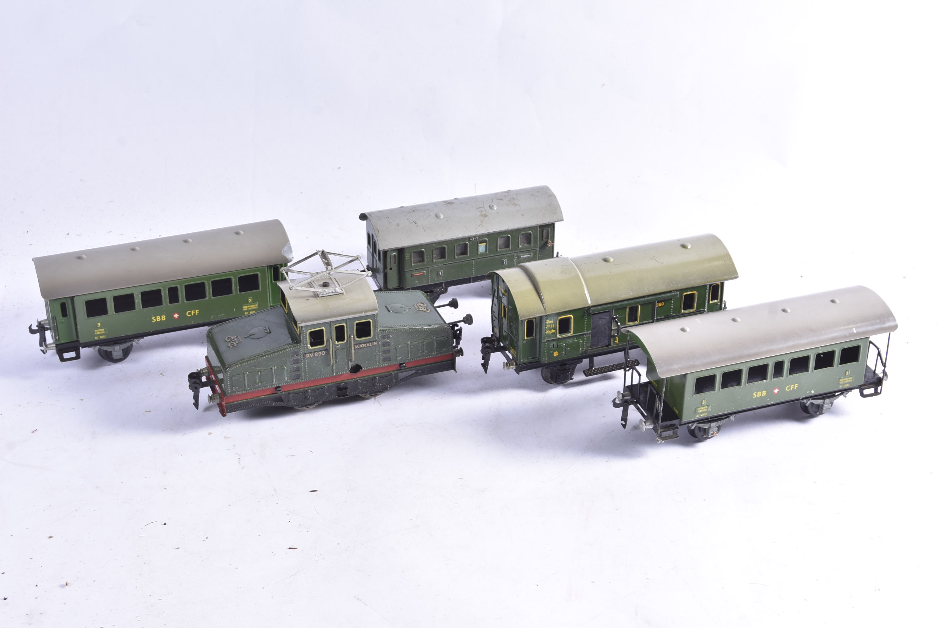 A Marklin 0 gauge clockwork RV890 Locomotive and assorted Continental Rolling Stock, the steeple-cab