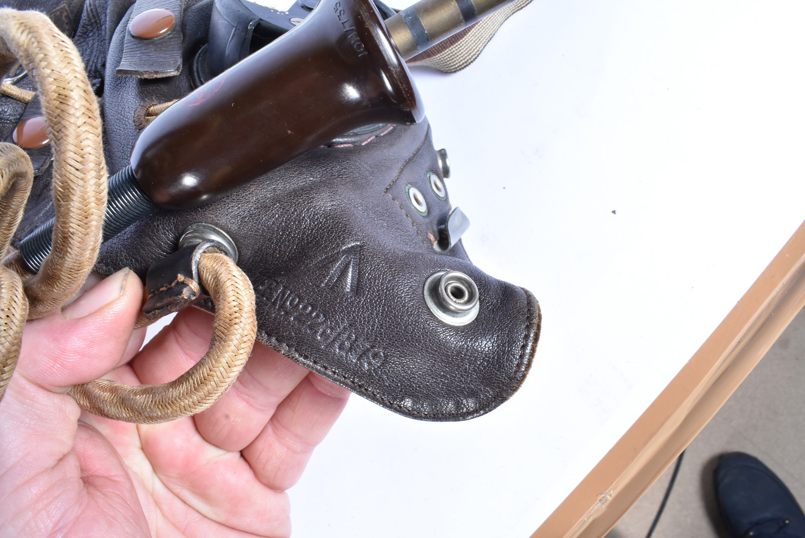 A Type C flying helmet, the brown leather helmet marked with broad arrow to the build in and wired - Image 8 of 10