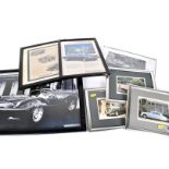 A collection of Jaguar related photographs and framed items, showing various models of Jaguar